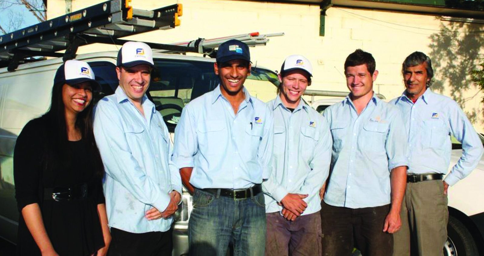 The FJ Electrical team in front of their work vehicle