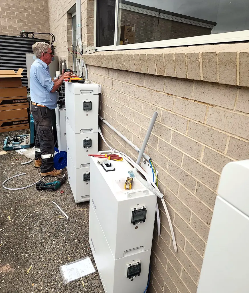 FJ electrician wiring stacked home battery modules